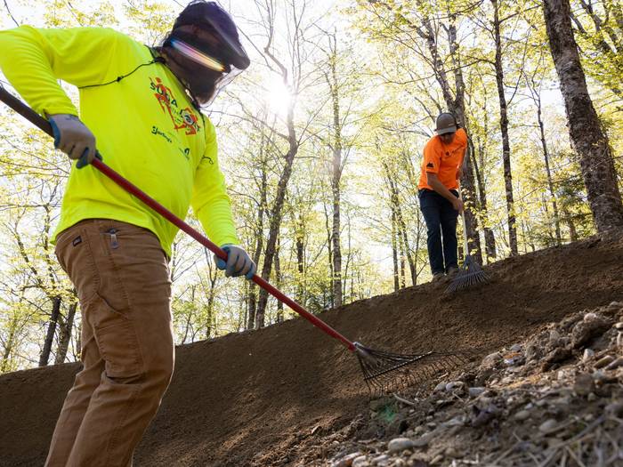 Trail crew on berm