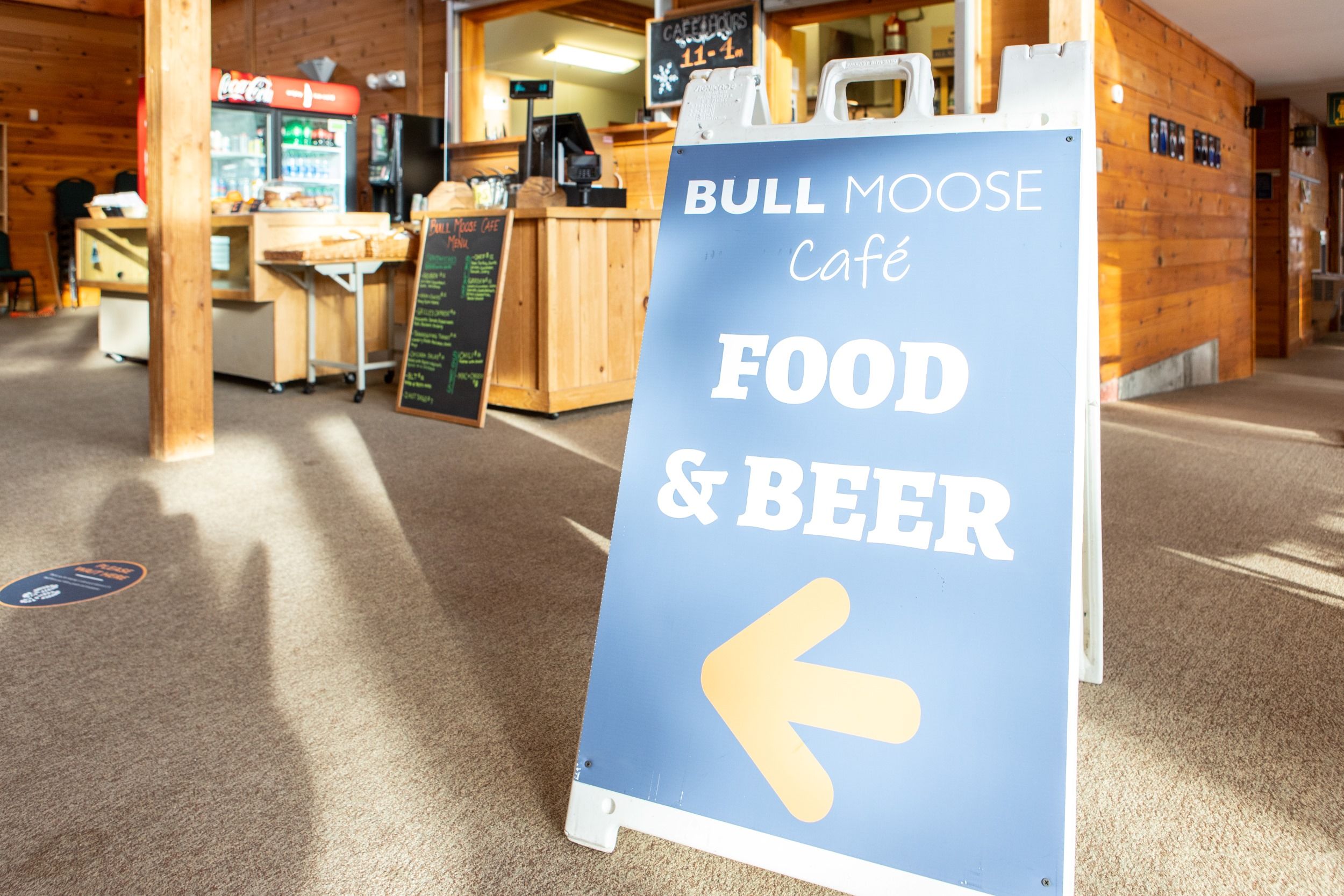 Sign in front of Bull Moose Cafe that says "Food & Beer"