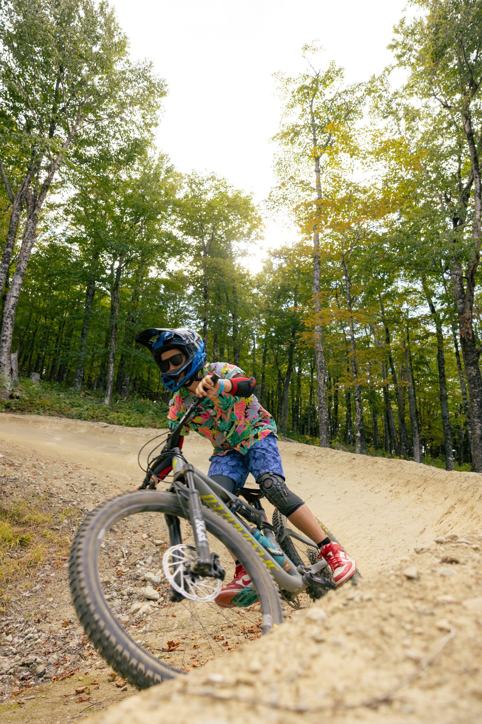 Young biker on berm