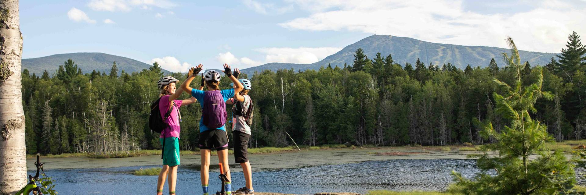 Mountain Bikers High Five