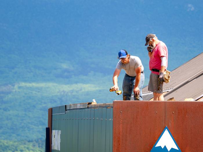 employees working on roof