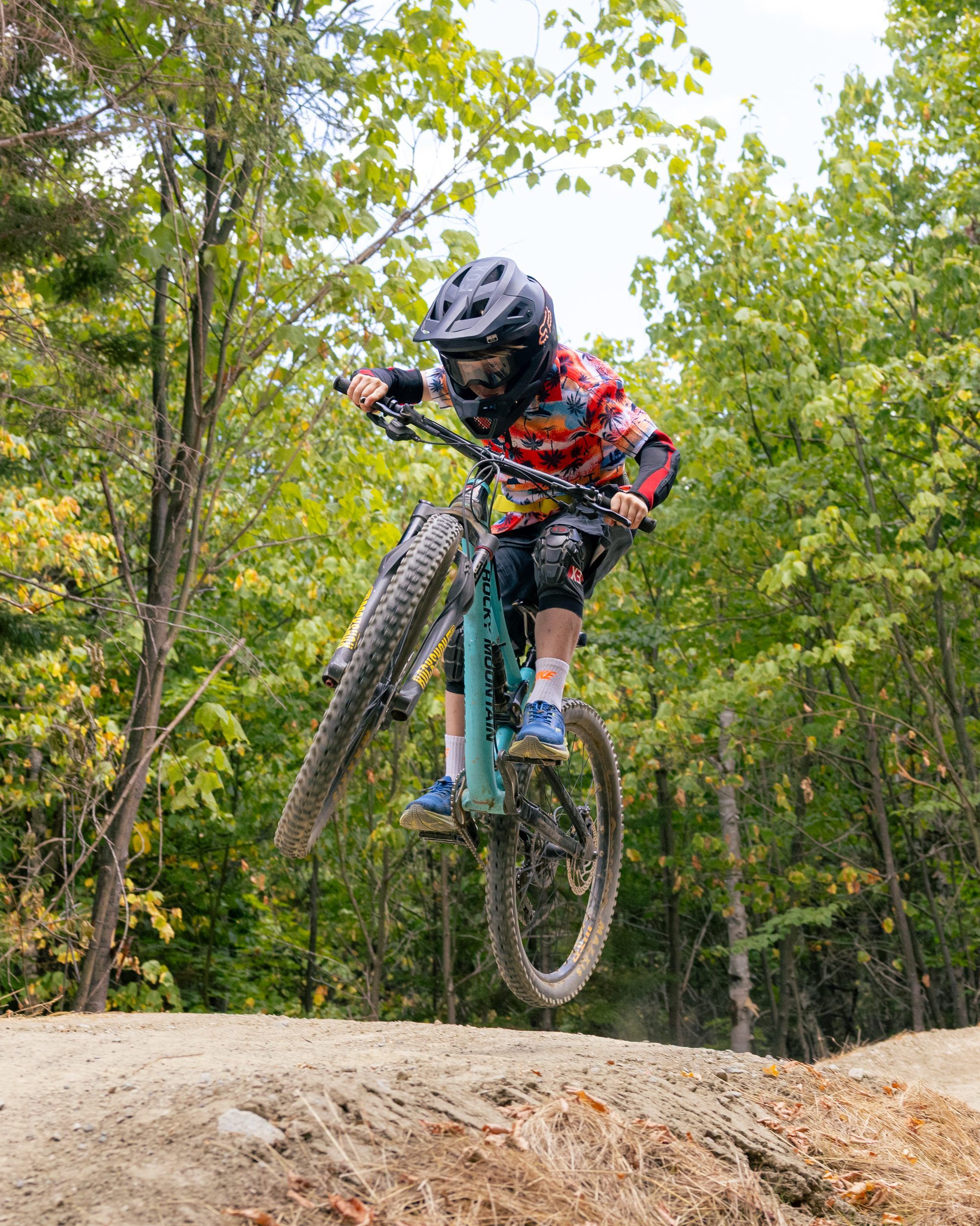 Young biker on jump