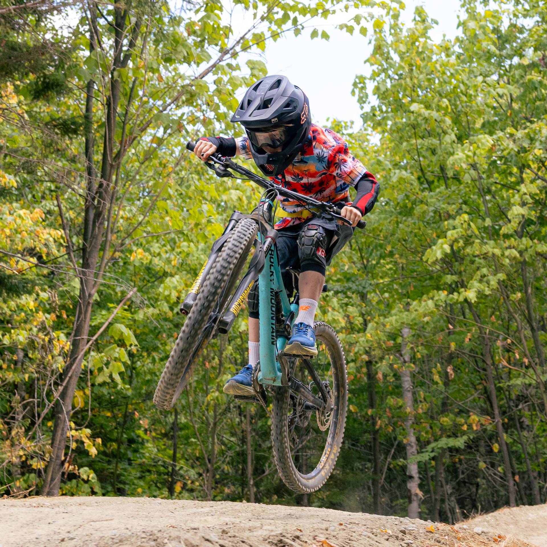 Young biker on jump