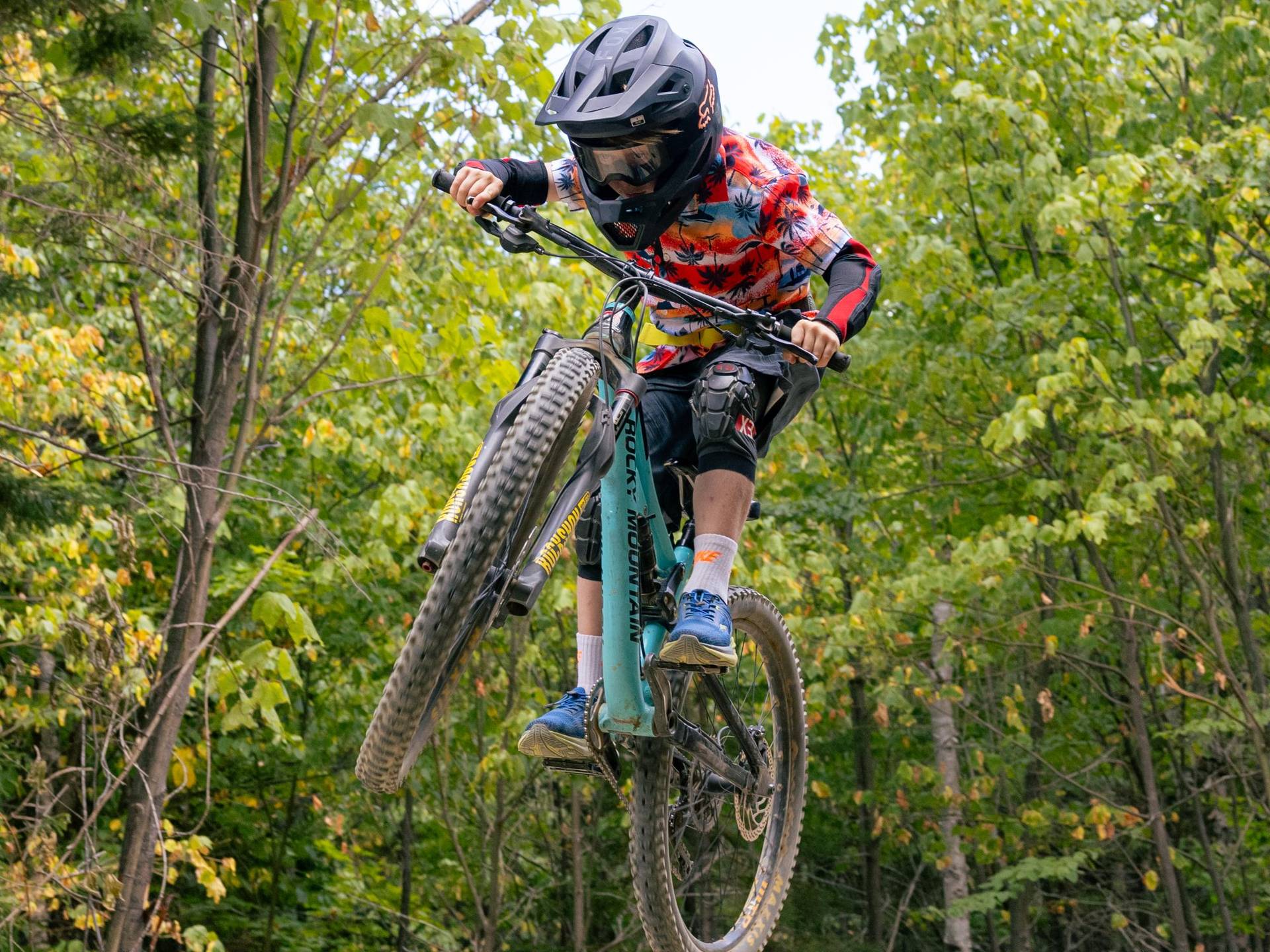Young biker on jump