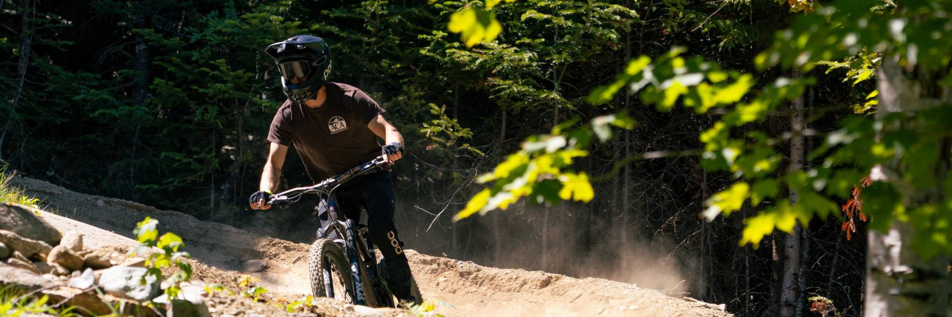 Biker looking ahead on berm