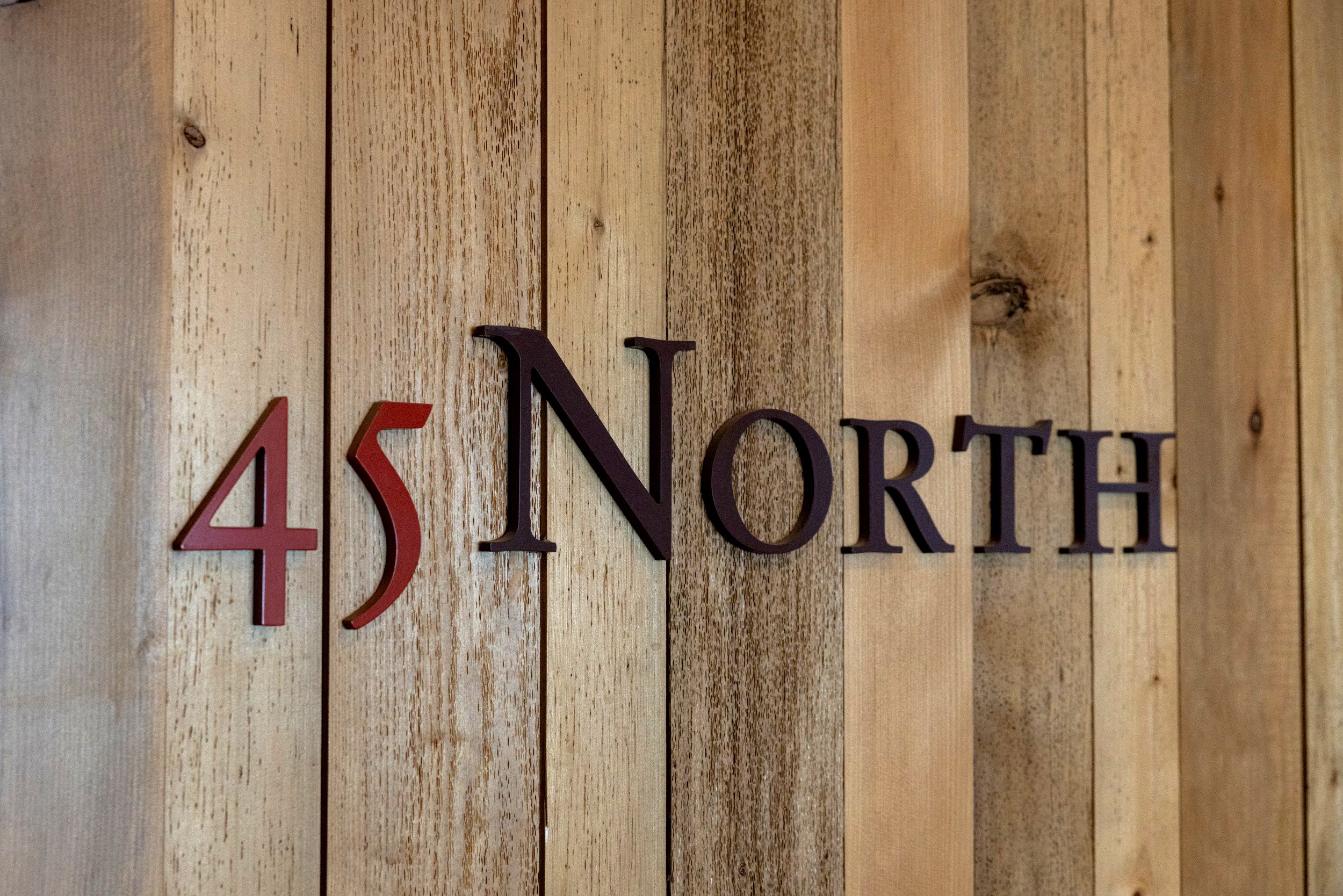 45 North logo on wooden wall