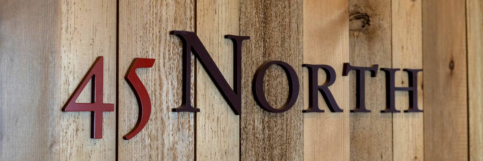 45 North logo on wooden wall