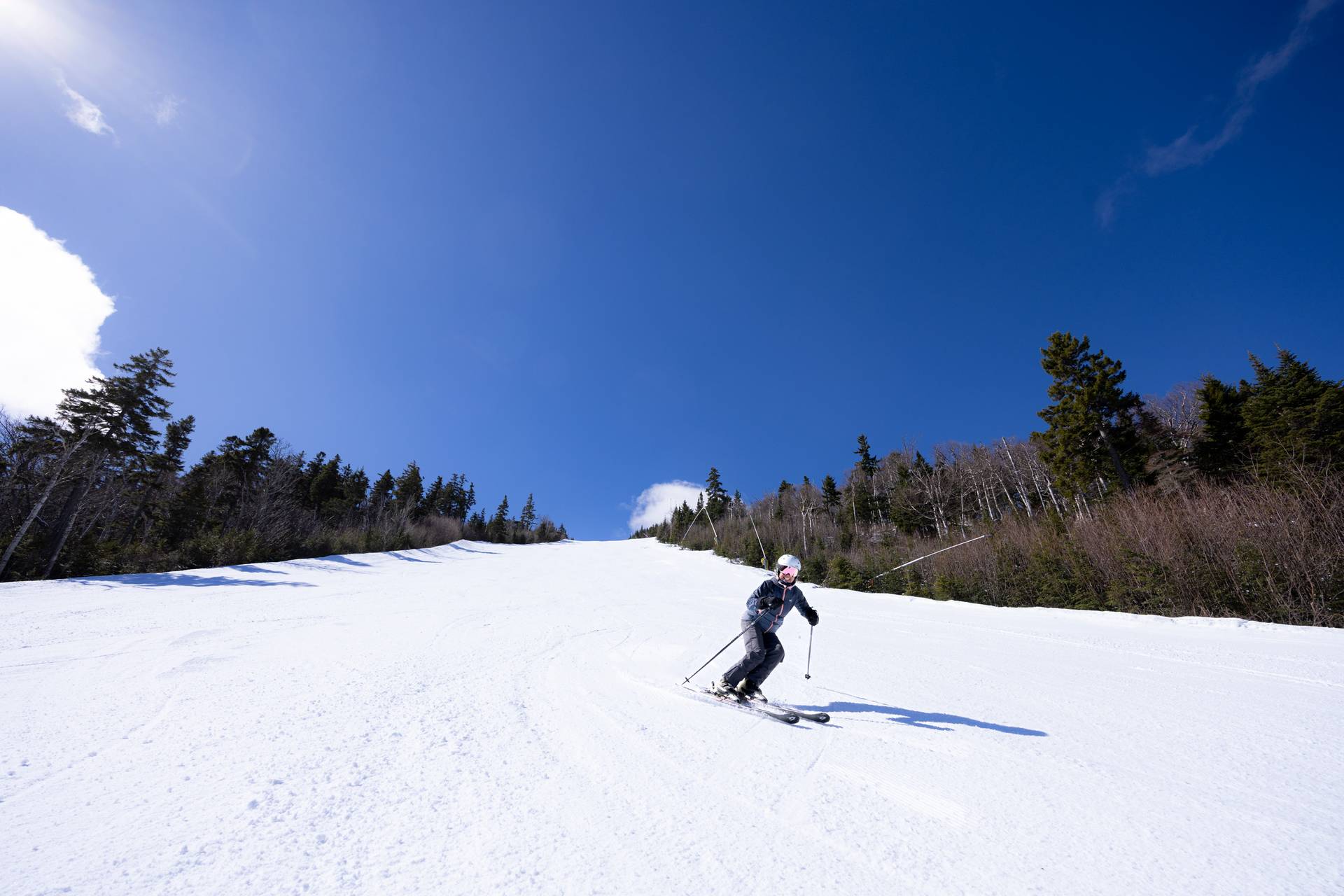 A skier smiles on Hayburner