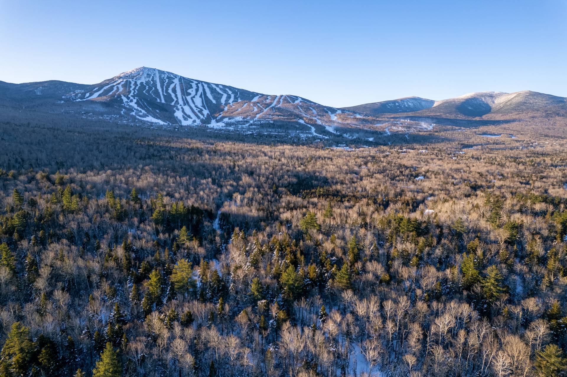 A drone photo of Sugarloaf on a sunny day