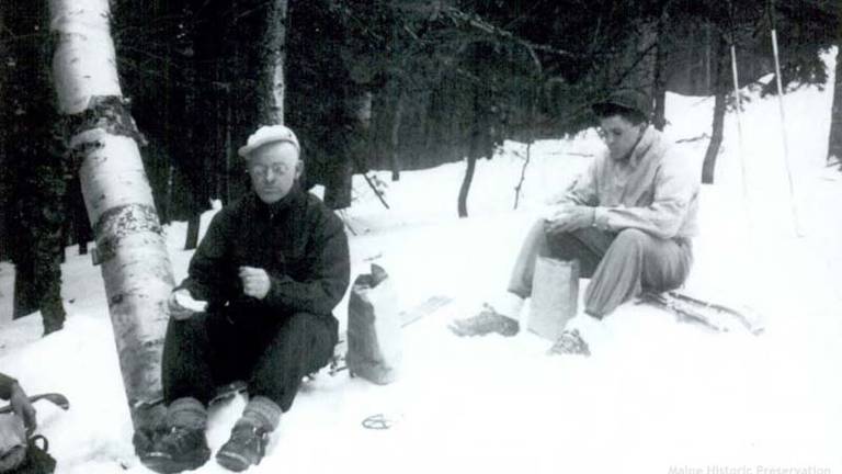 Amos winter sitting on snow