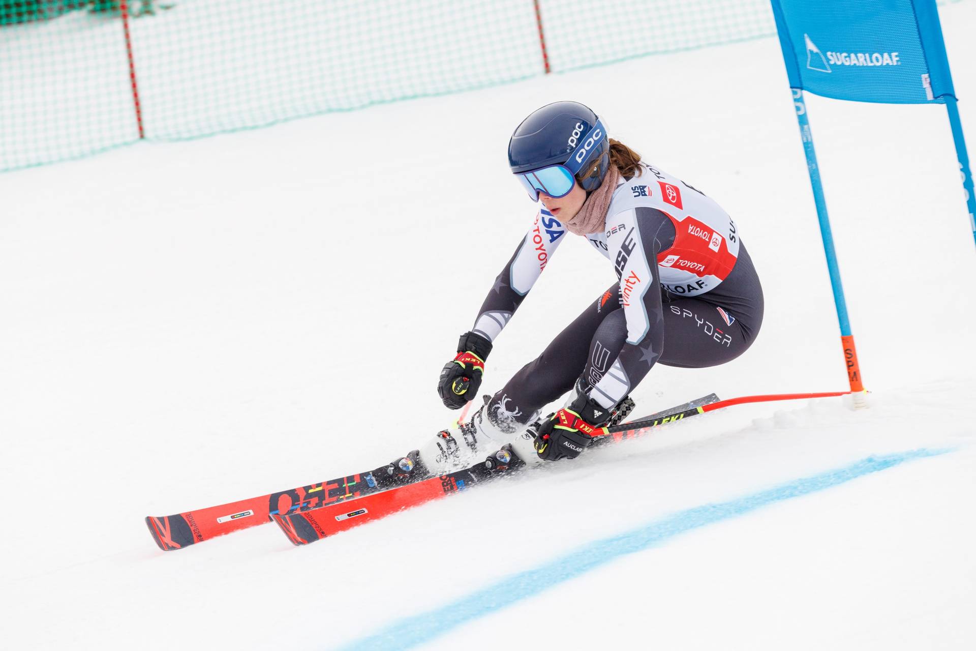 Ski racer passing a gate