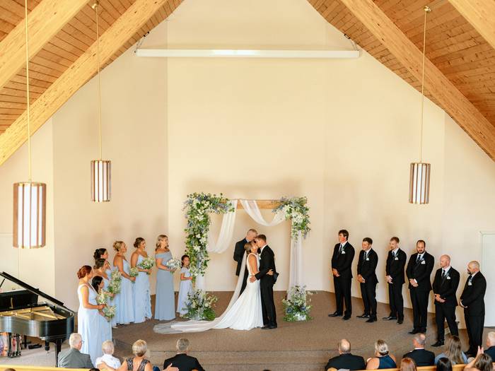 Bride and Groom first kiss in chapel