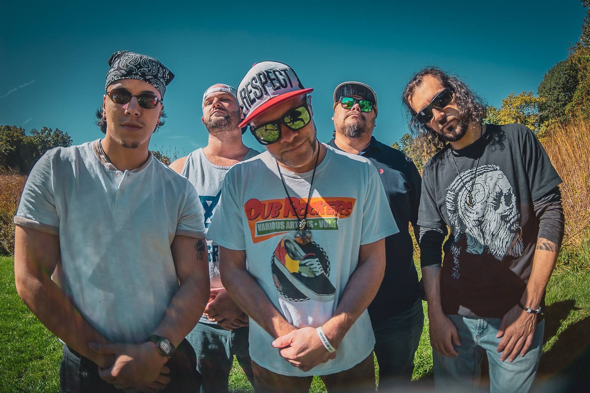 IRIEspect the band in front of a blue sky