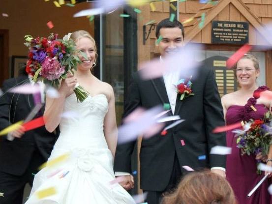 Married couple exiting chapel