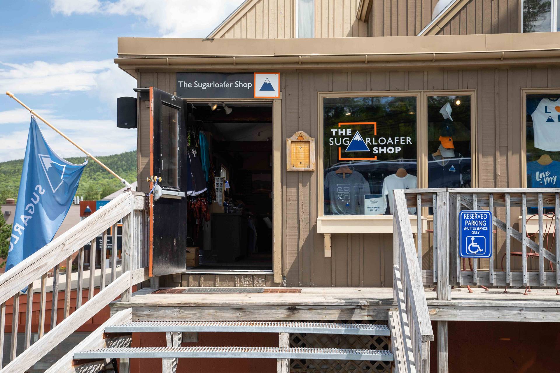 The Sugarloafer Shop with an open door on a summer day