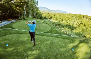 Golfer mid-swing