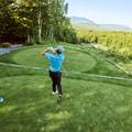 Golfer swinging a club