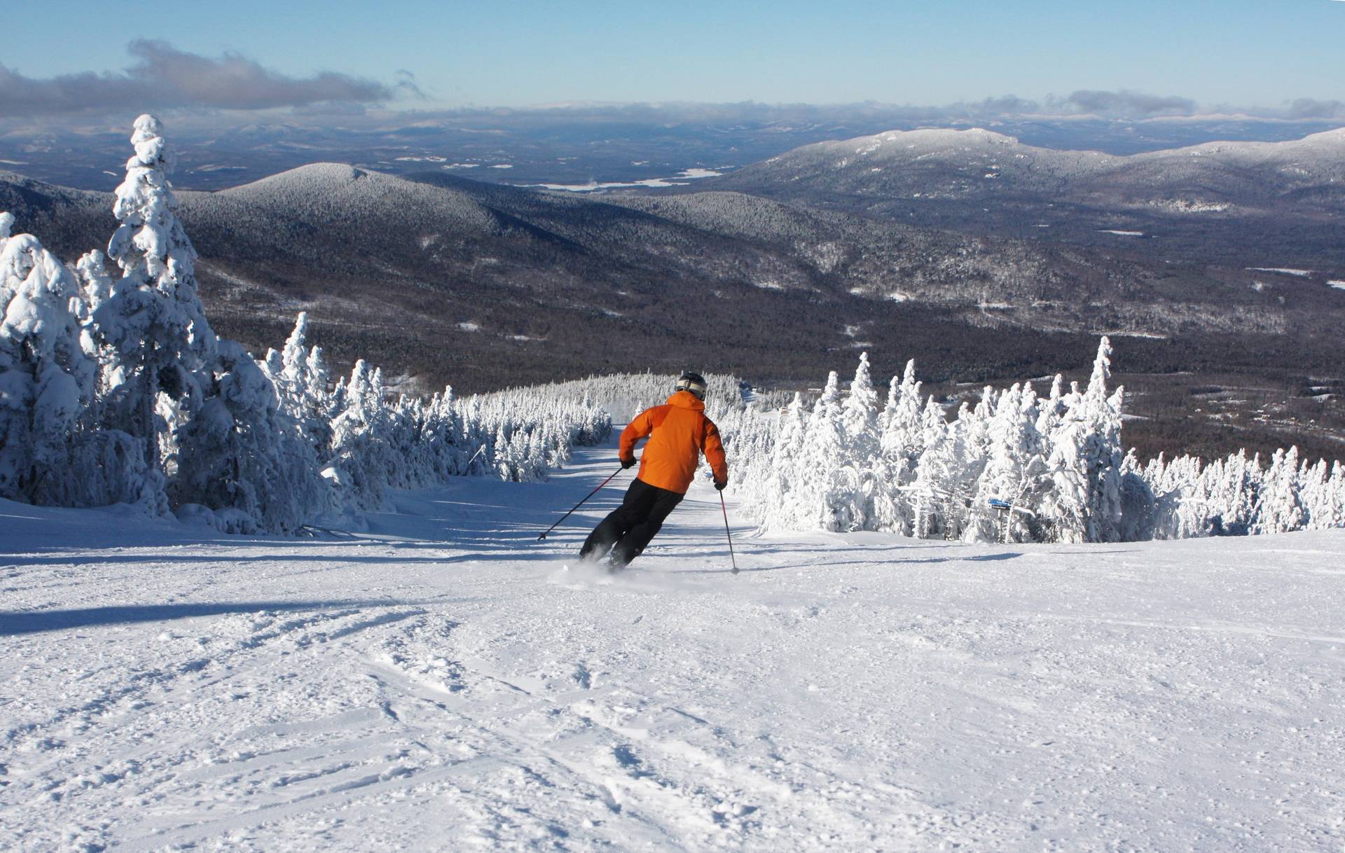 skier on groomer trail