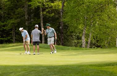 Golfers high fiving