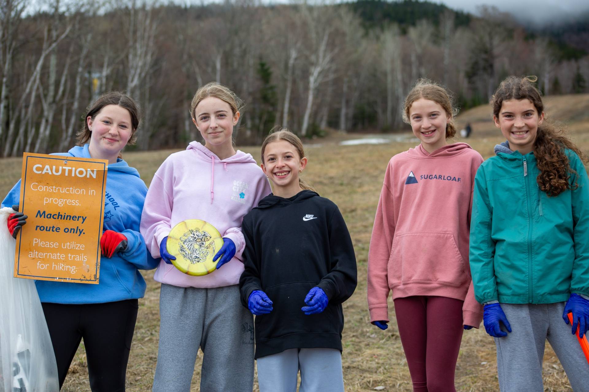 Youth clean up volunteers