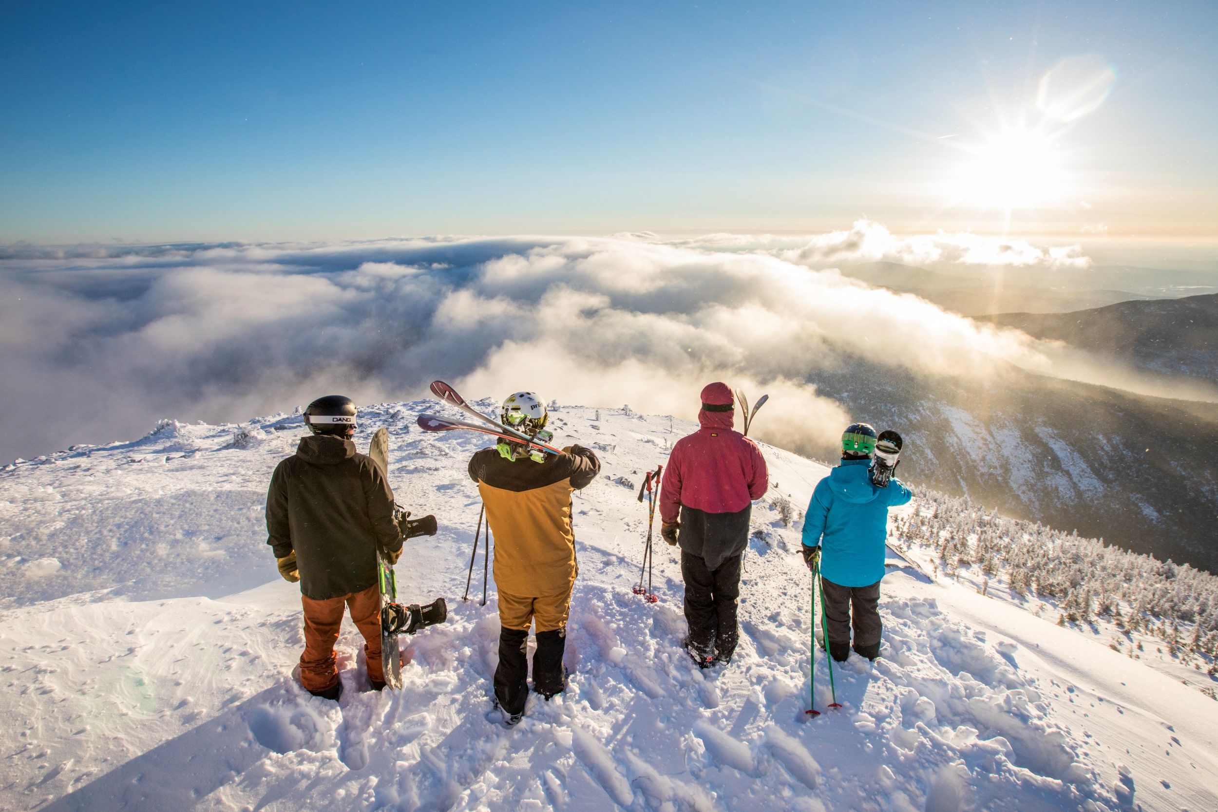 Skiers at summit during inversion