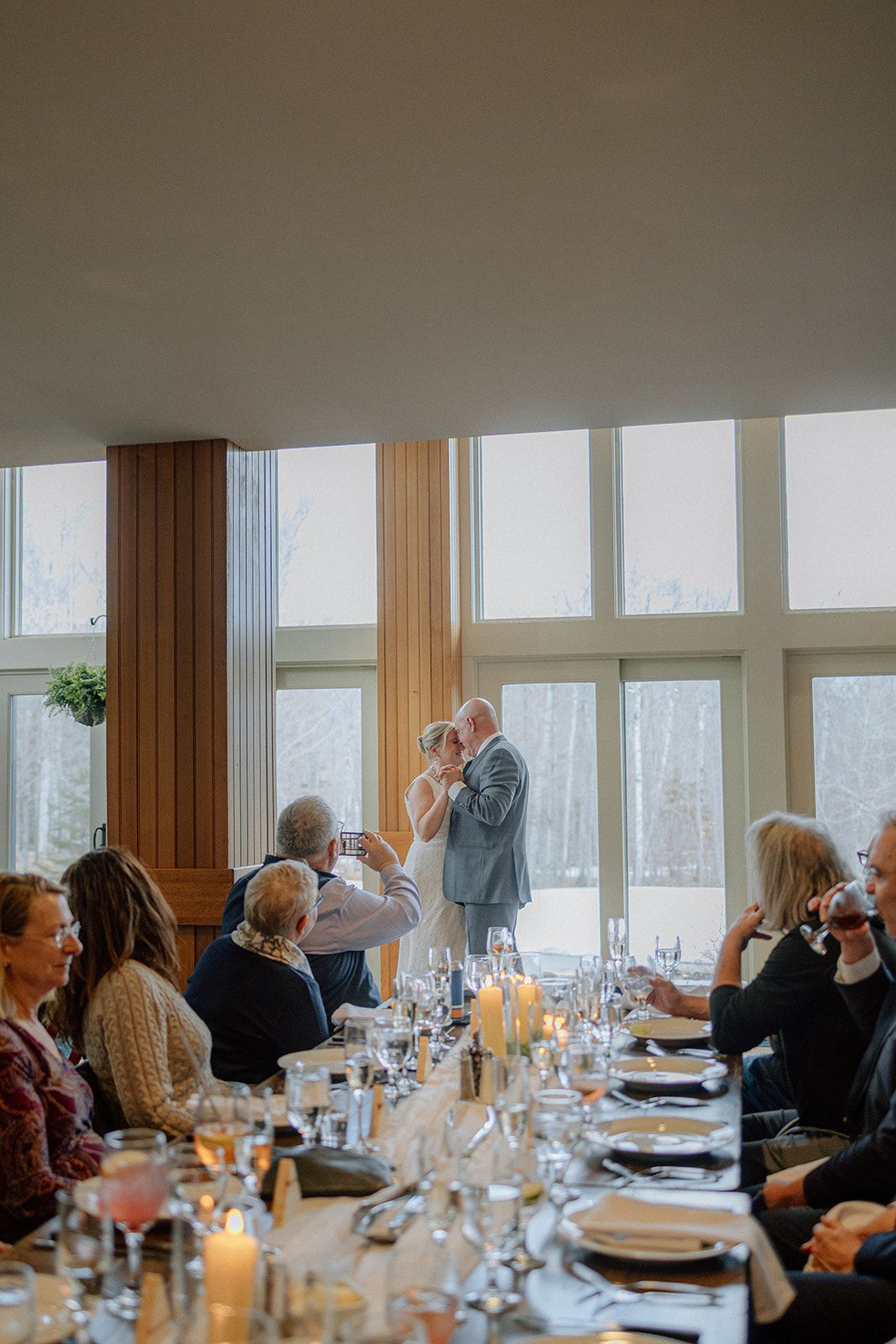 Couple infront of windows