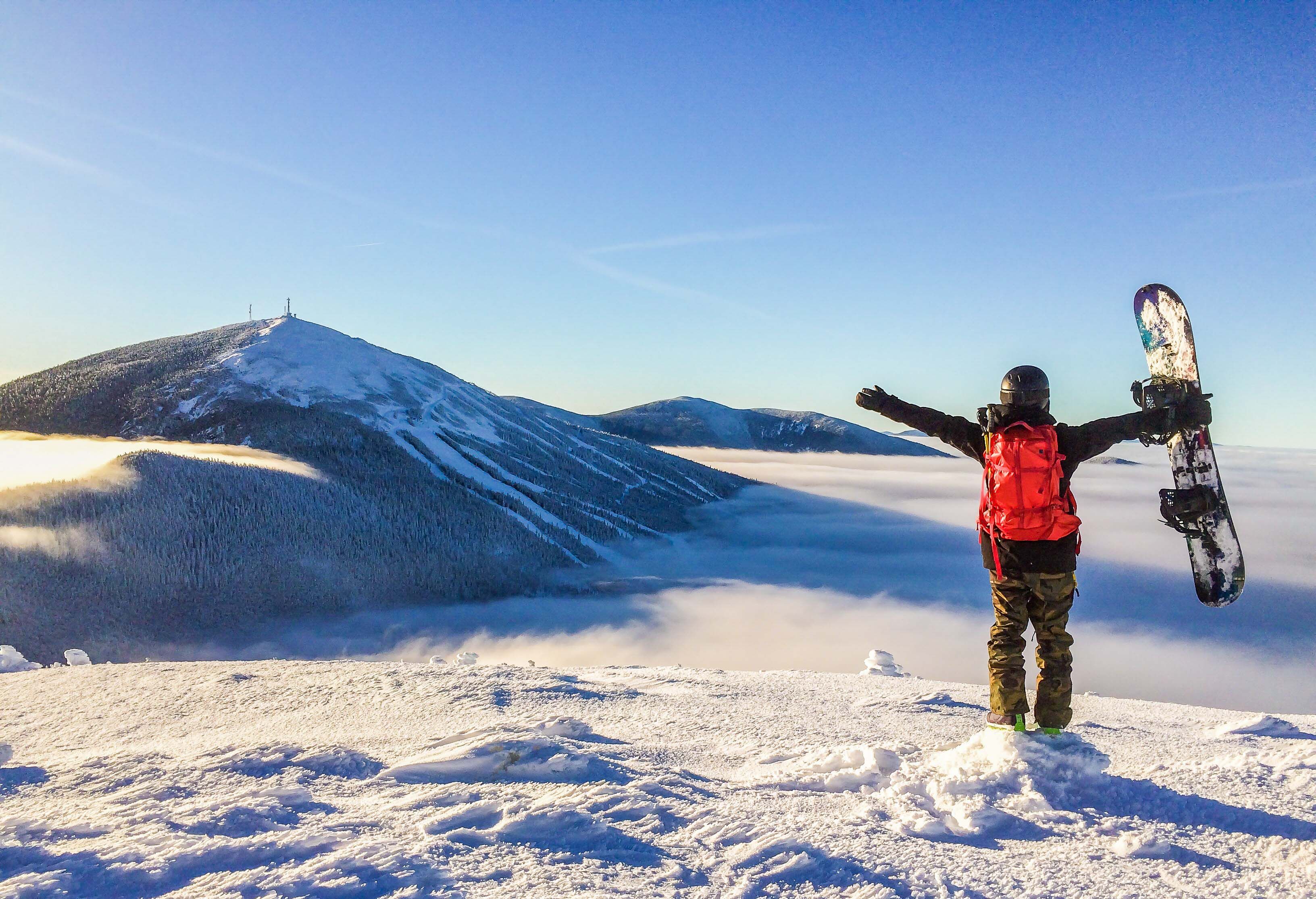 Snowboarder on Burnt Mountain summit