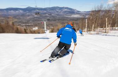 Instructor skiing