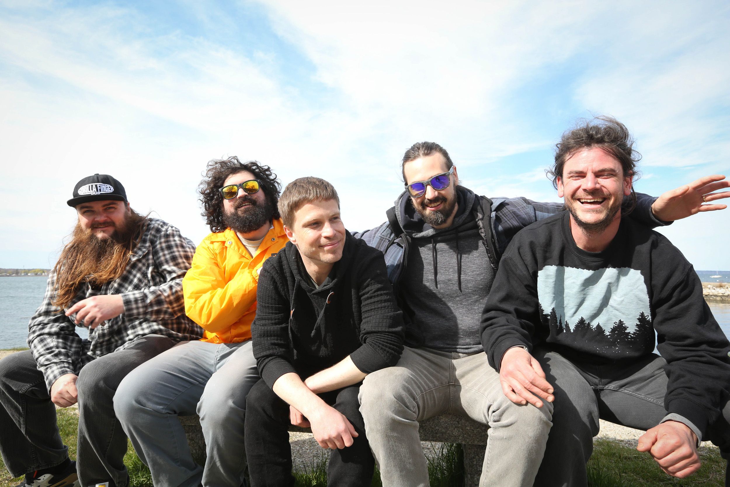 Gorilla Finger band poses together beside the ocean
