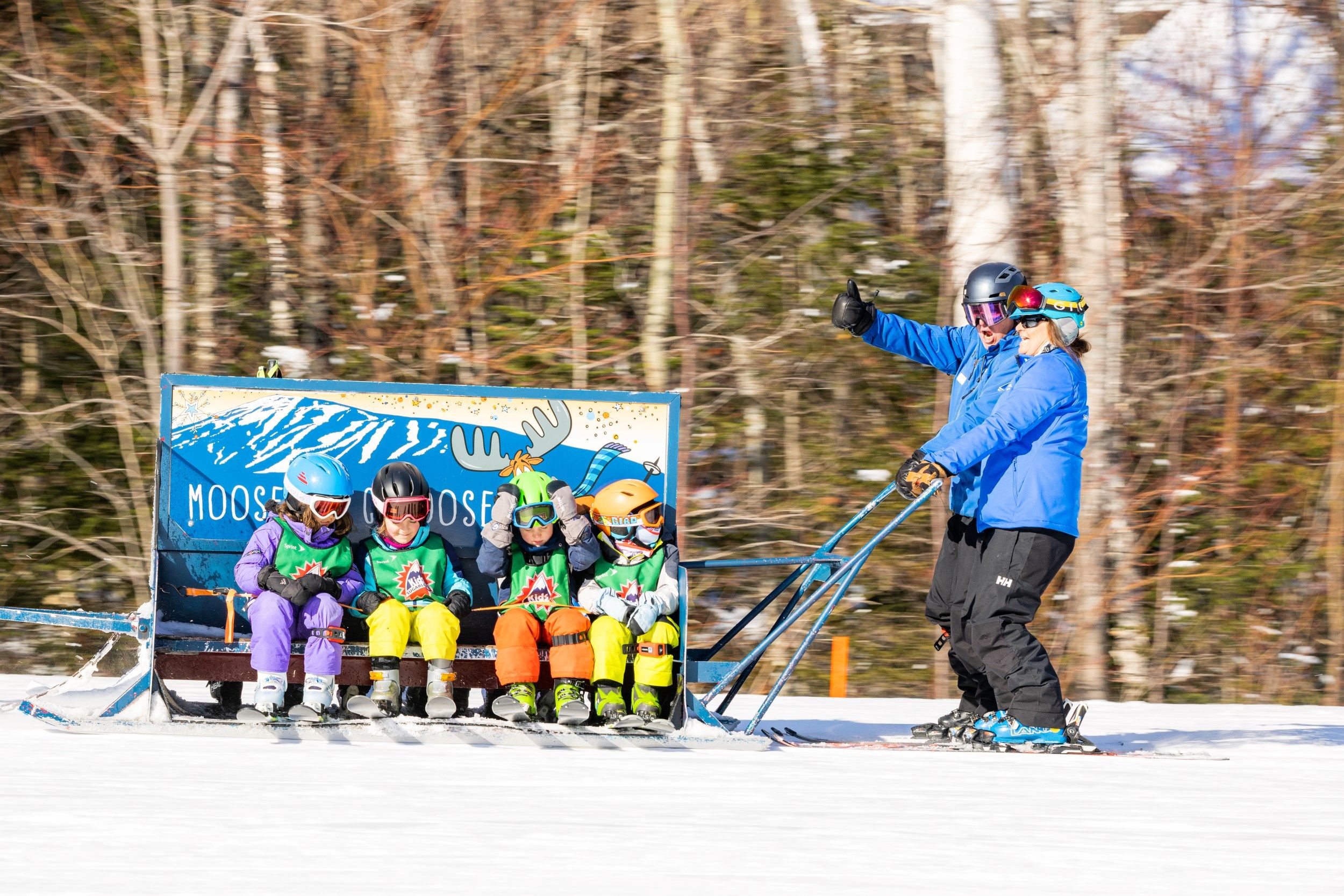 Ski school students on the Moose Caboose 