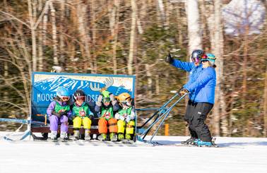 young students on the moose caboose