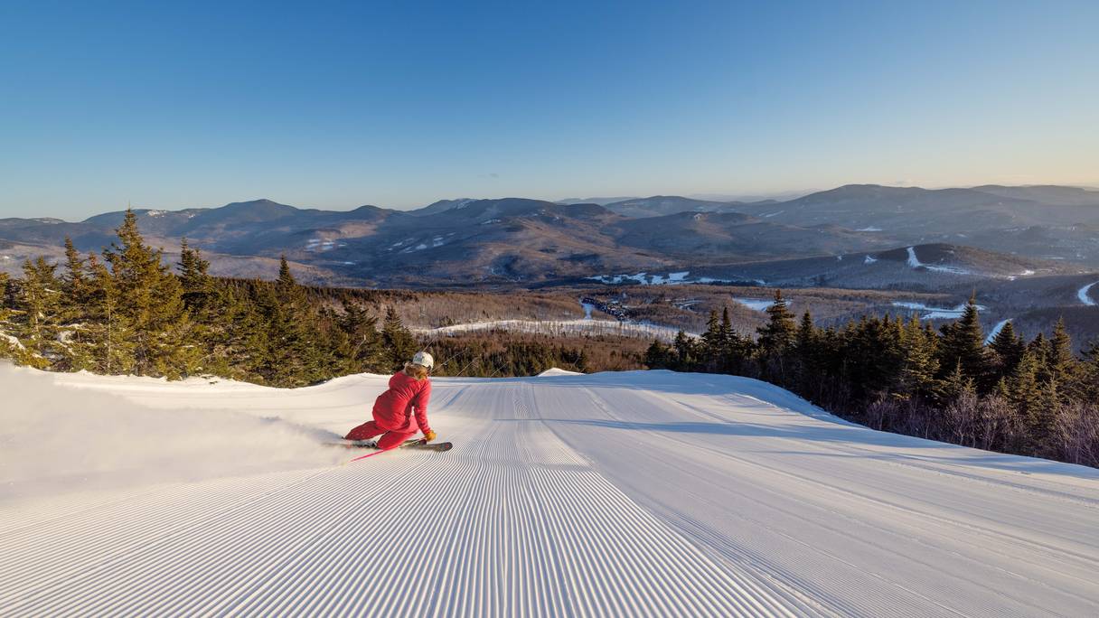 Skier on fresh corduroy.