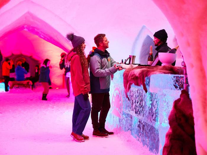 A couple at the Ice Bar at Sunday River's Igloo