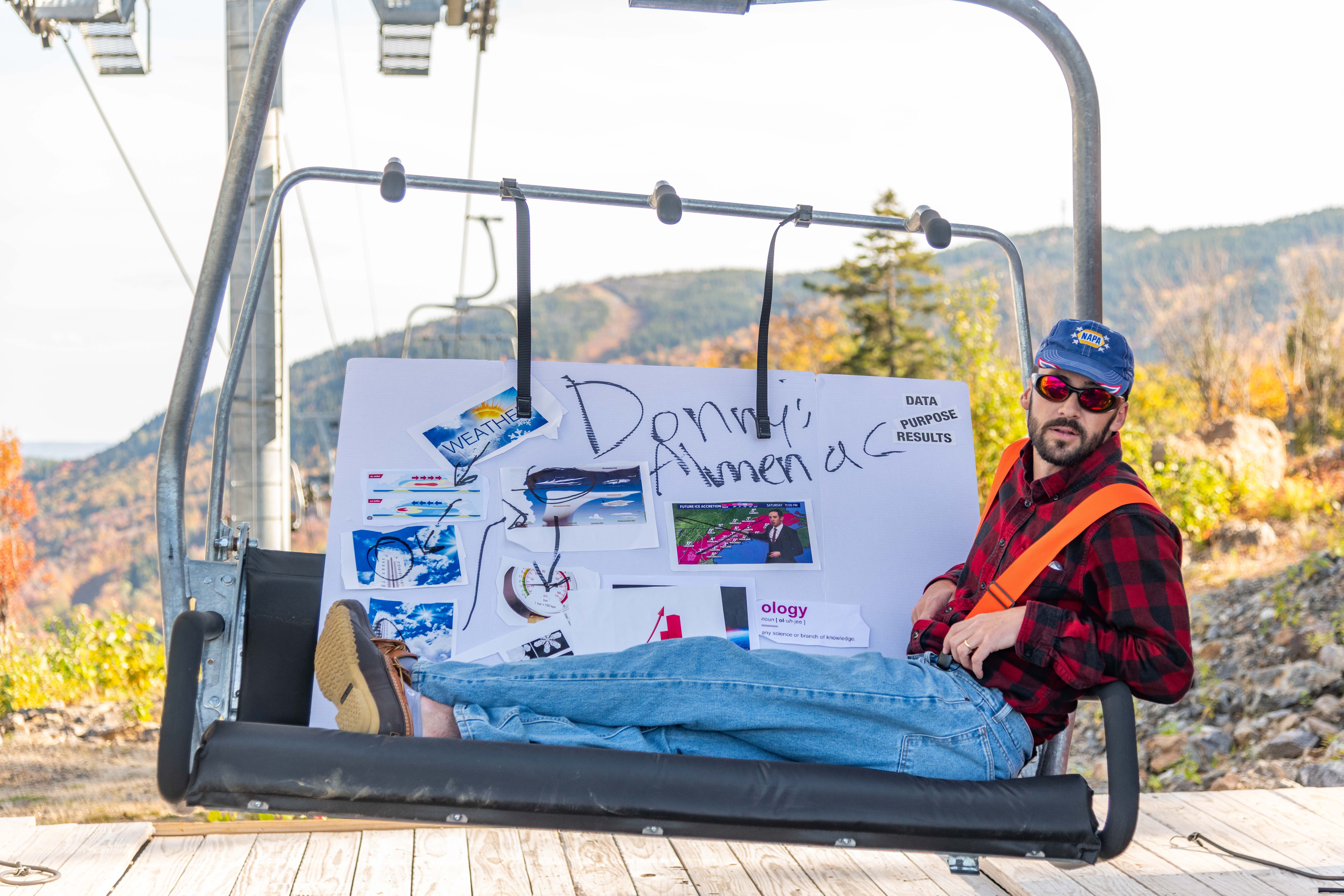 Donny Pelletier on a chairlift with his Almanac