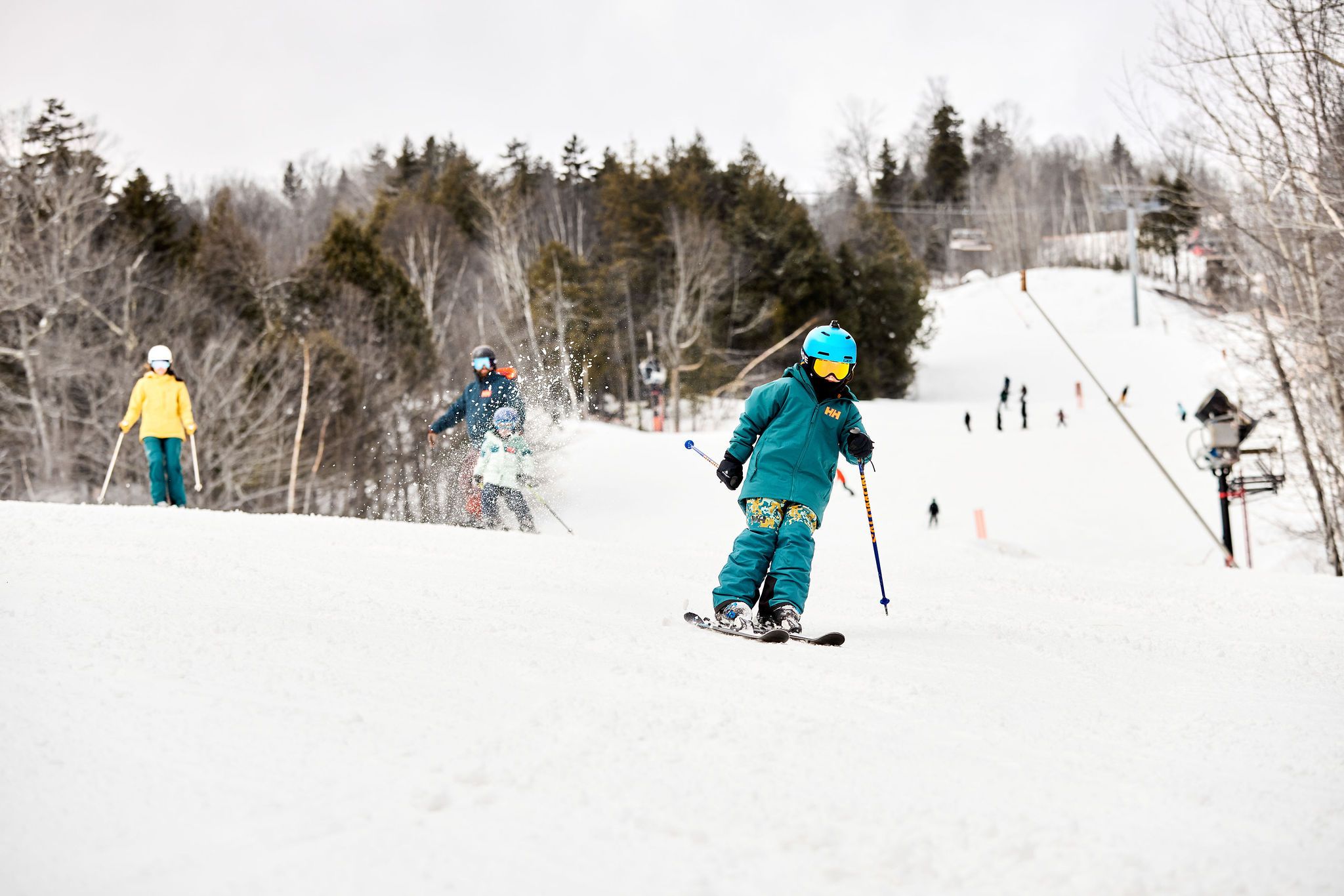 A family skiing together at Sunday River.