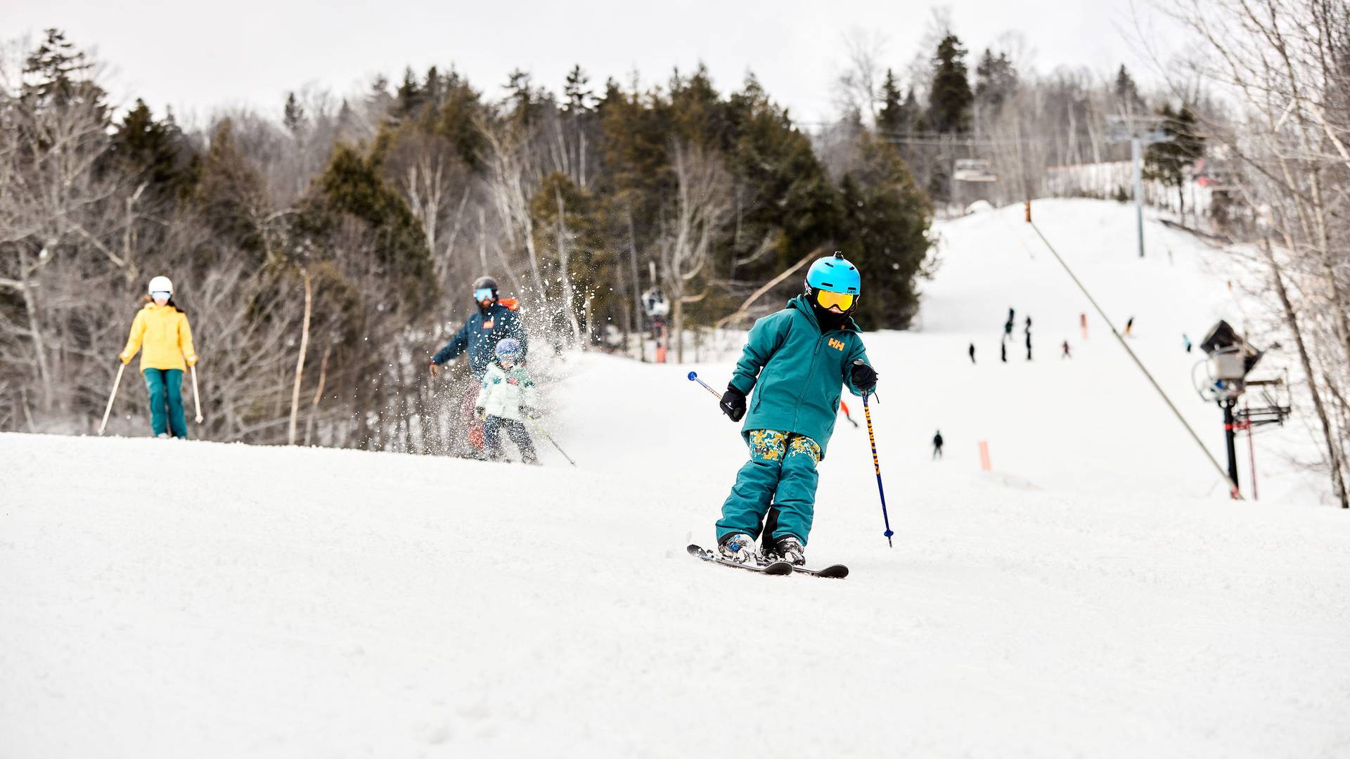 A family skiing together at Sunday River.