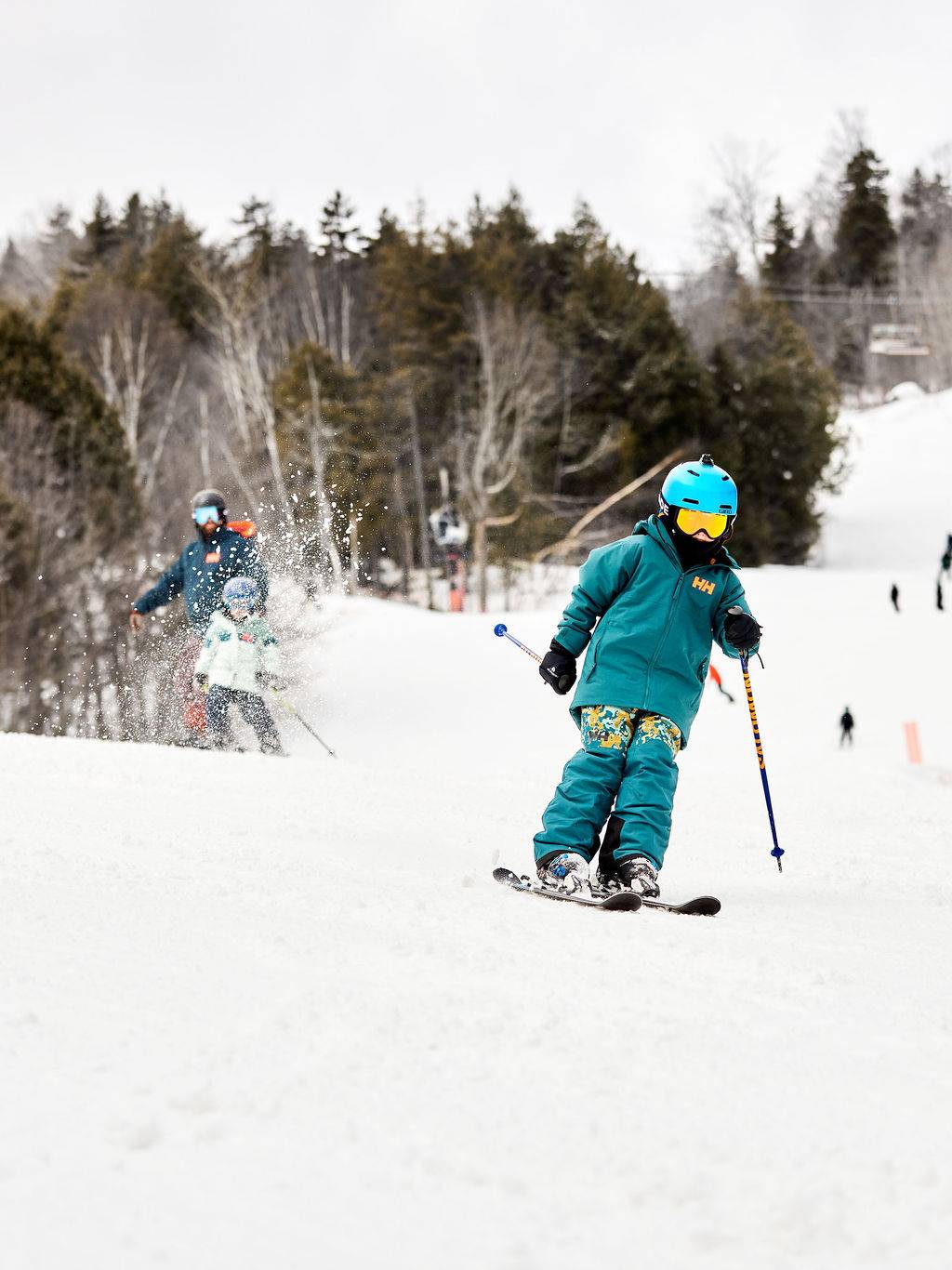 A family skiing together at Sunday River.