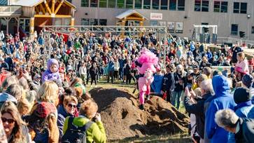 People participating in Sunday River's North American Wife Carrying Championship.