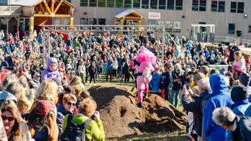 People participating in Sunday River's North American Wife Carrying Championship.