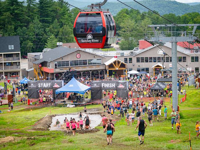 People crossing the finish line at Tough Mountain Challenge at Sunday River.