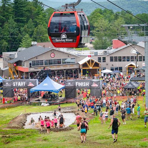 Competitors crossing the finish line at Sunday River's Tough Mountain Challenge.