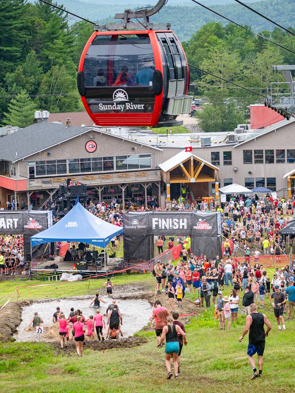 People crossing the finish line at Tough Mountain Challenge at Sunday River.