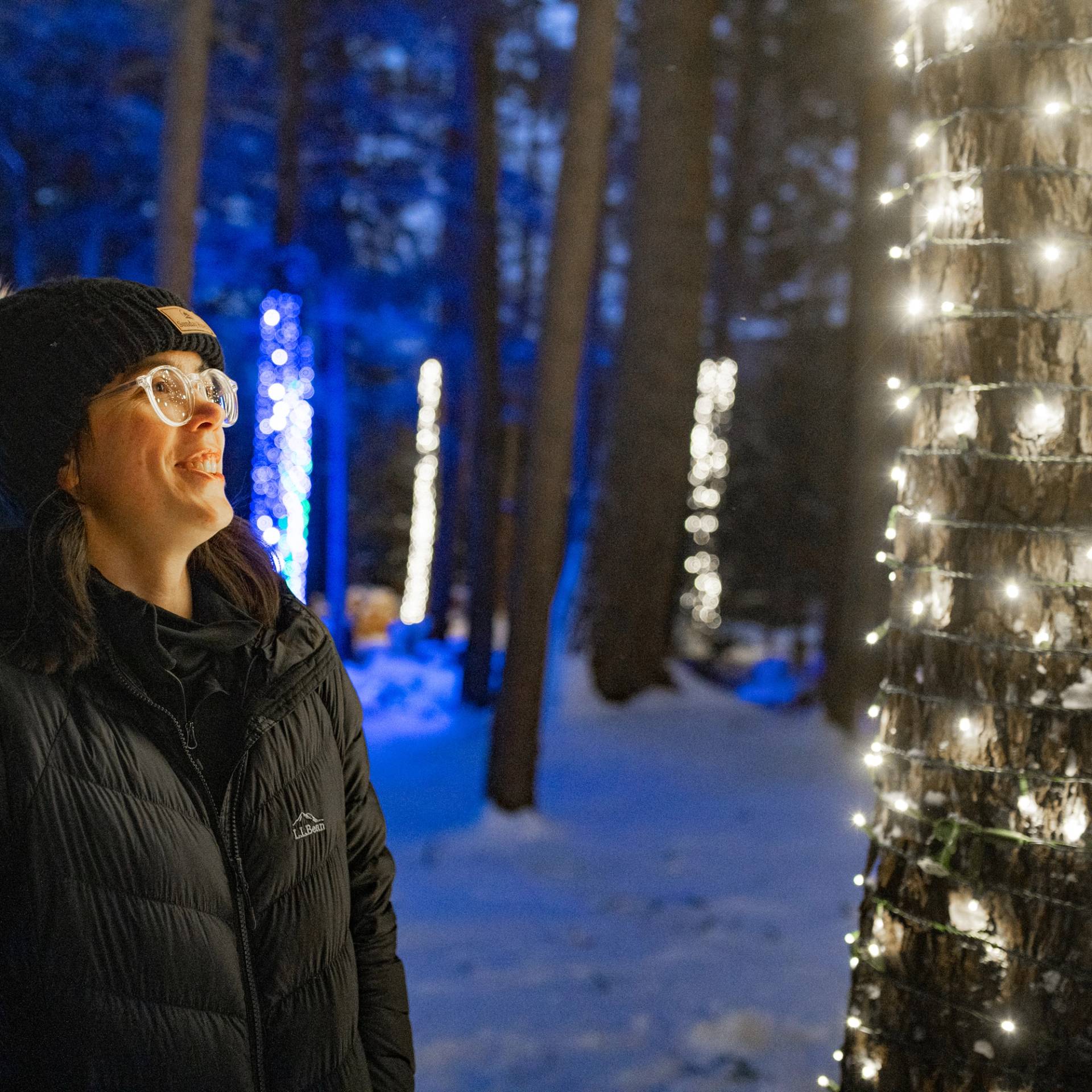 A person enjoying the walking path at après aglow at Sunday River.