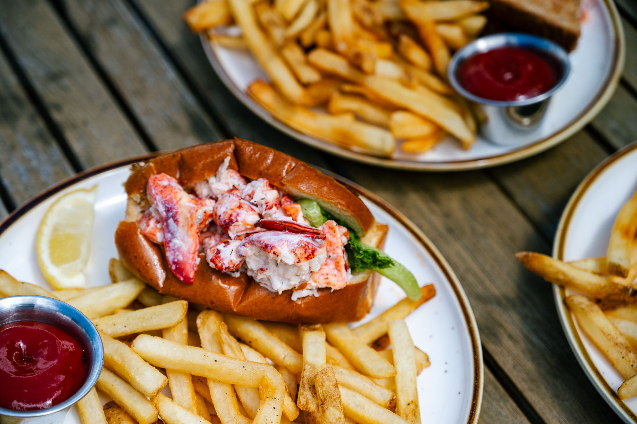 A lobster roll and fries.