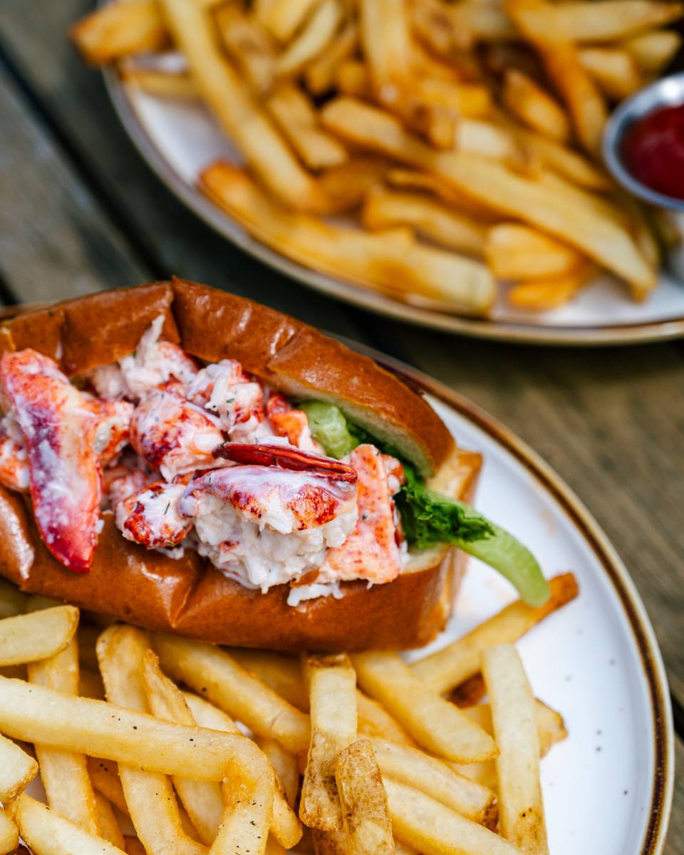A lobster roll and fries.