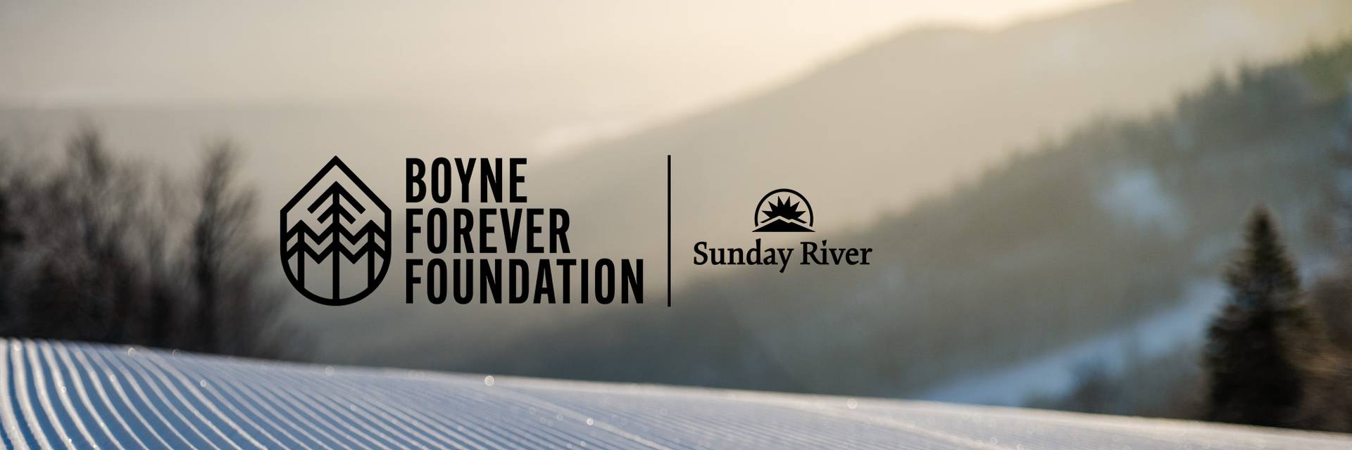 Boyne Forever Foundation Logo with Sunday River on top of scenic background.