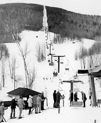 Skiers loading the Barker Mountain Double in the 1970s at Sunday River.