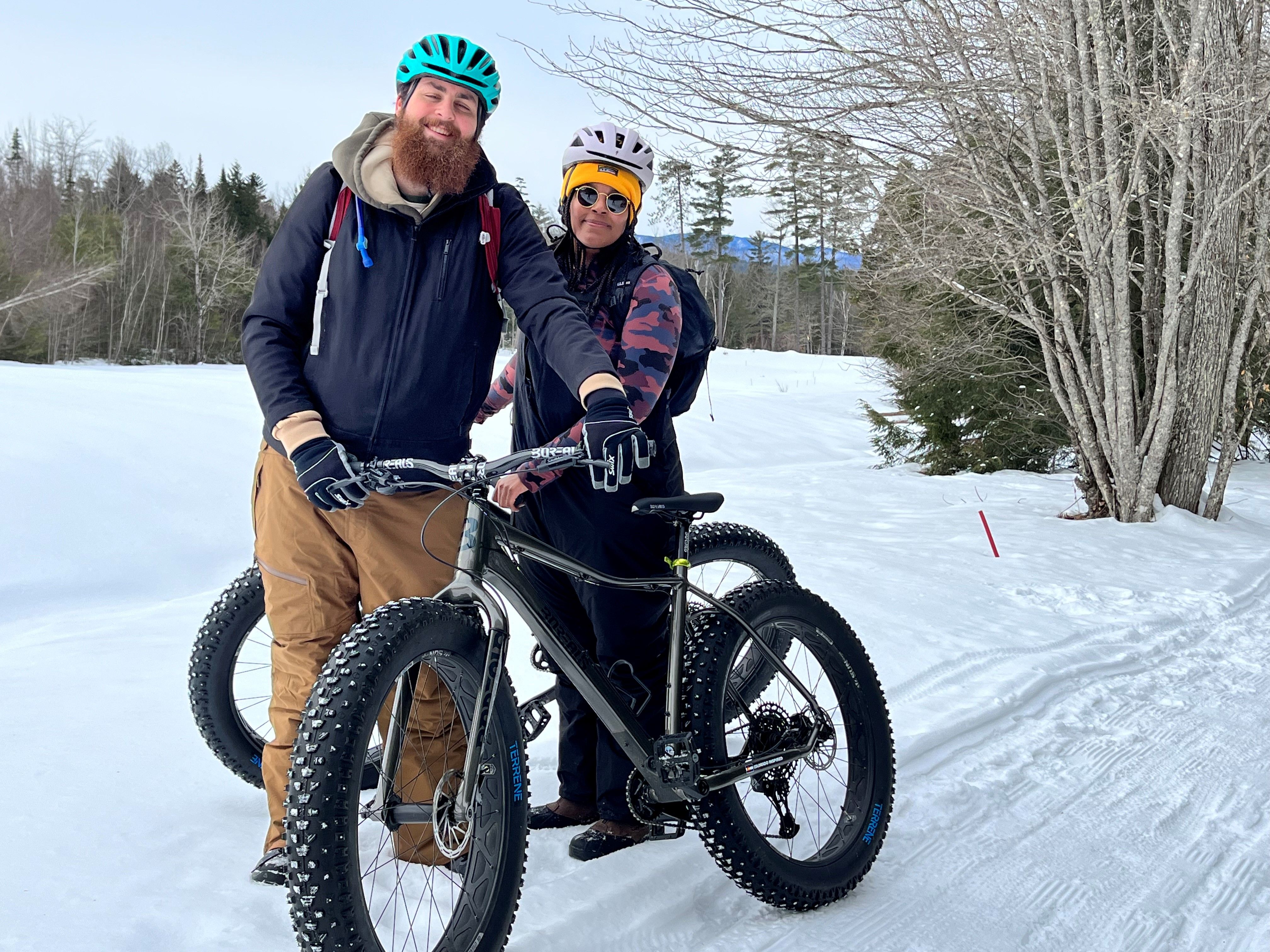 Guests participating in using a Fat Bike during the winter with Bethel Outdoor Adventure.