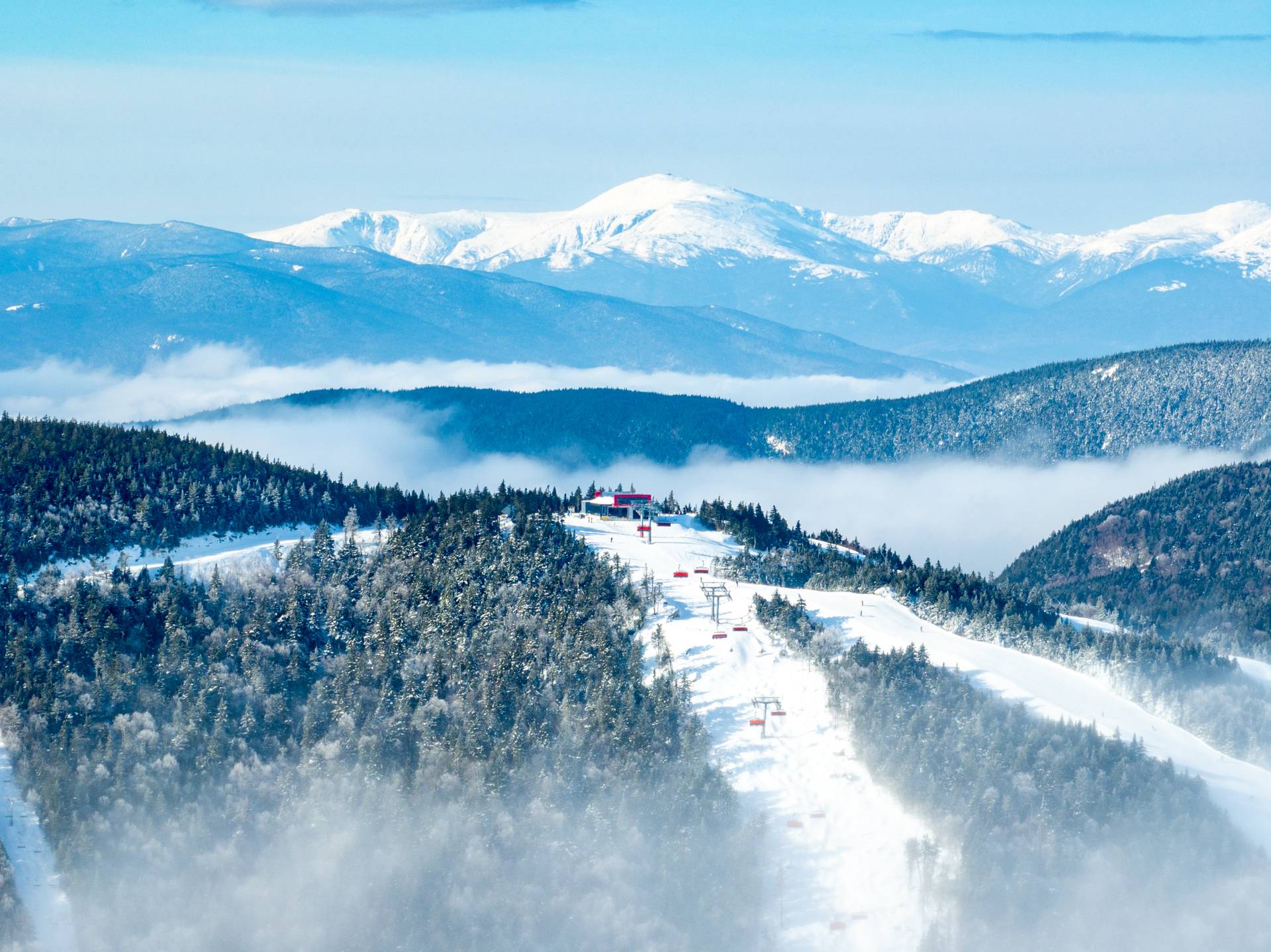 Snowmaking out in Jordan with the Presidentials in the background.