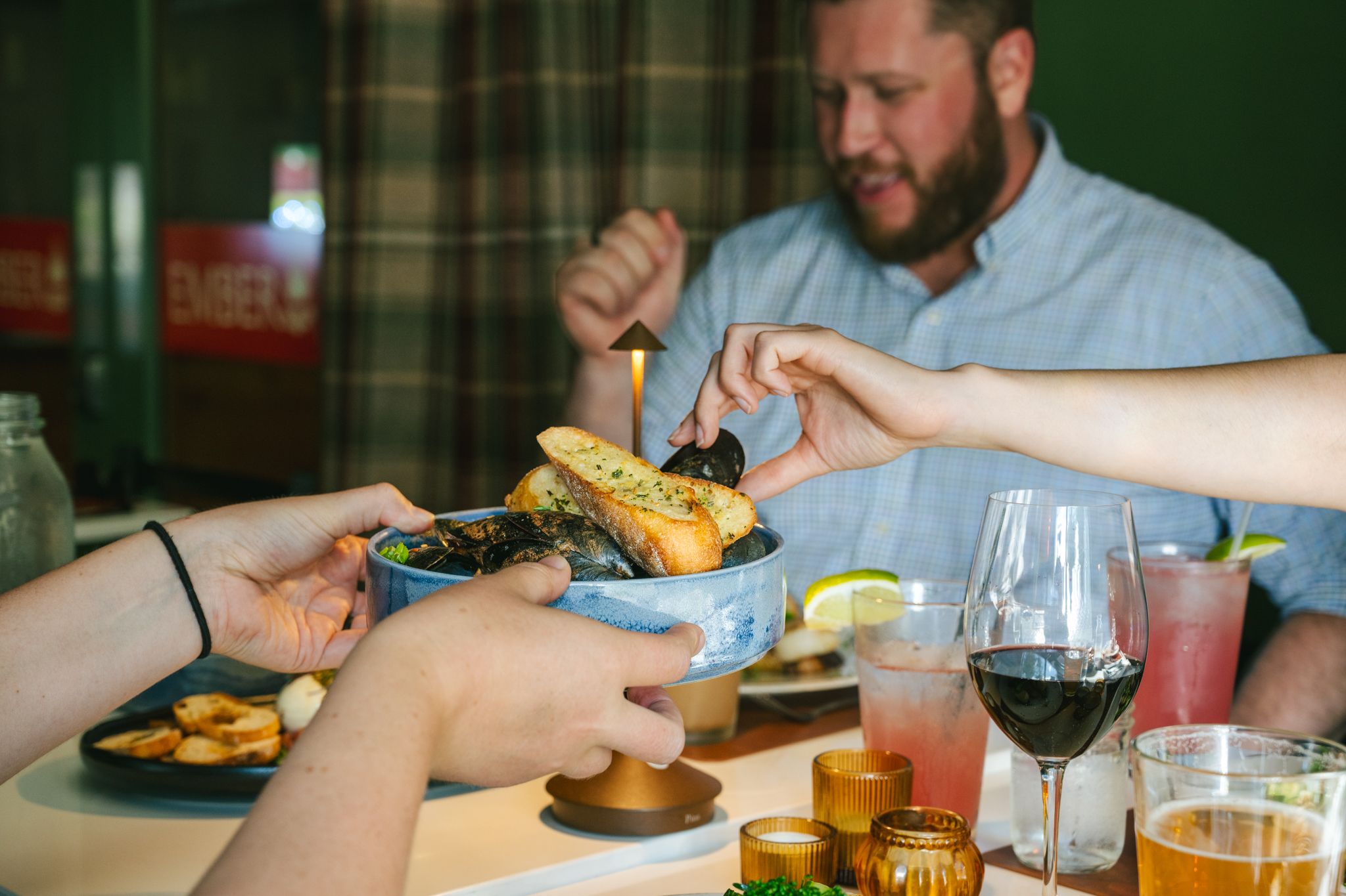 A person grabbing mussels at Sunday River. 